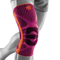 Bauerfeind Sports Knee Support knästöd i rosa med orange detaljer