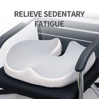 Sittkudde placerad på kontorsstol vid användning