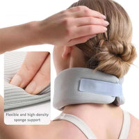 Ergonominen niskatuki muistivaahtomuovista niskaa ja selkää varten