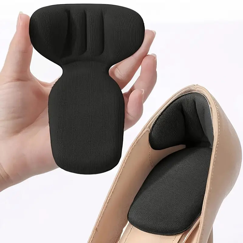 T-muotoiset kantapäätyynyt itseliimautuvalla taustalla (2-pack)